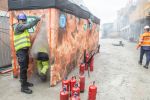 Symulacja pożaru i ewakuacja na budowie nowego biurowca. Widowiskowe szkolenie [ZDJĘCIA], 